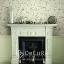 Victorian fireplace with lit candles and metallic pots and vases